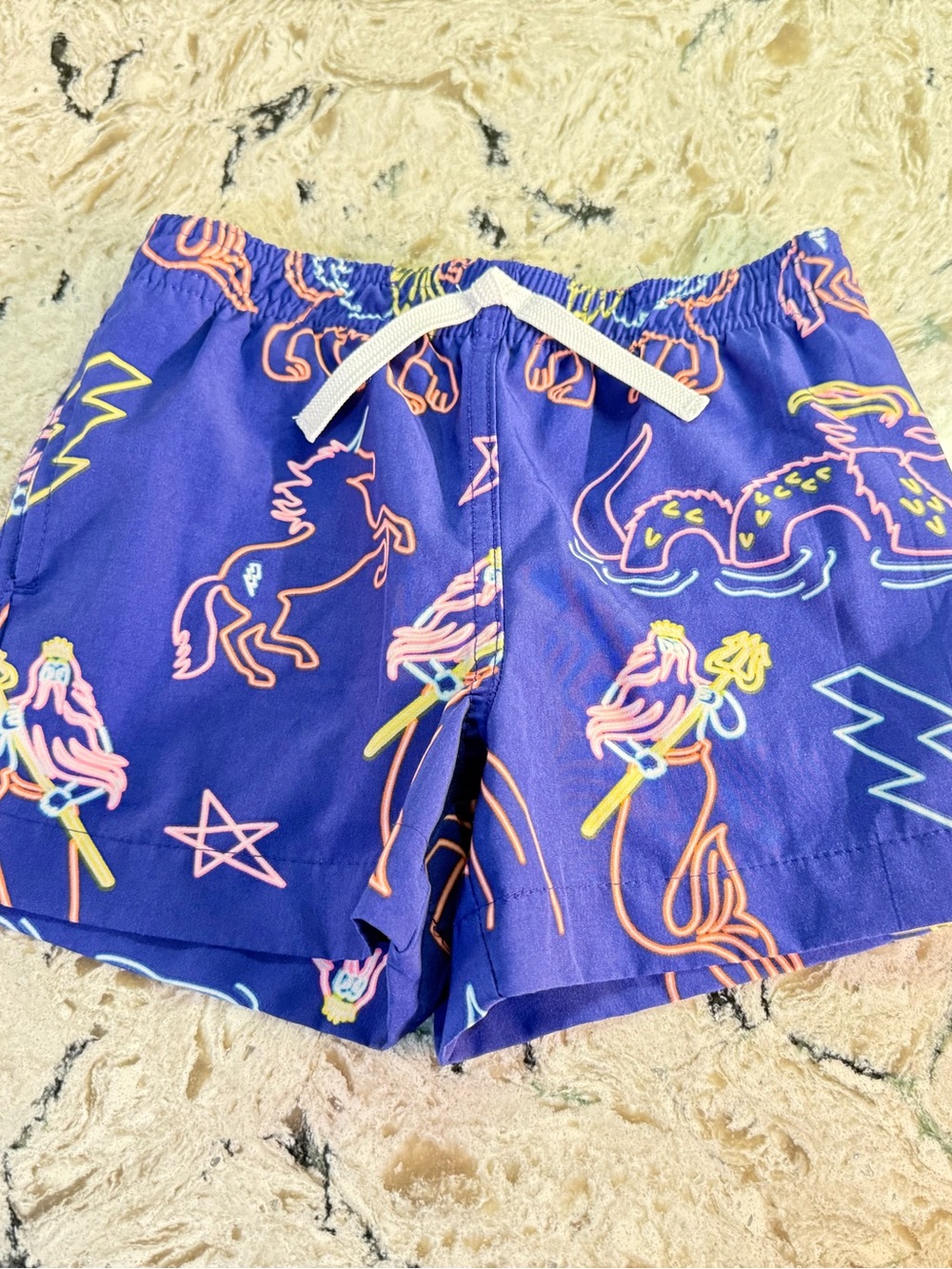 Chubbies Kids Swim Trunks in Blue with Neon Pink, Yellow & Blue Prints